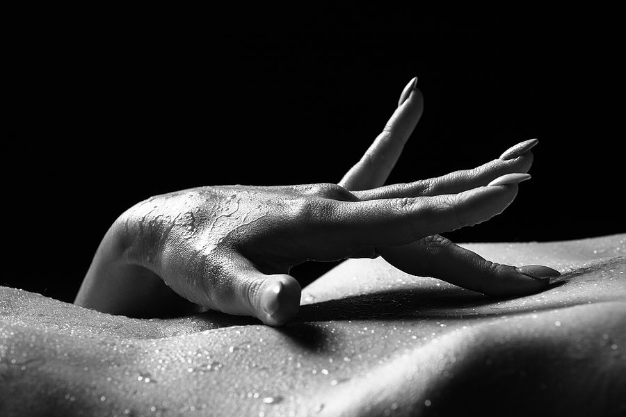 A close-up of a hand over a body, showcasing sensuality, perfect for Masturbators & Strokers collection.