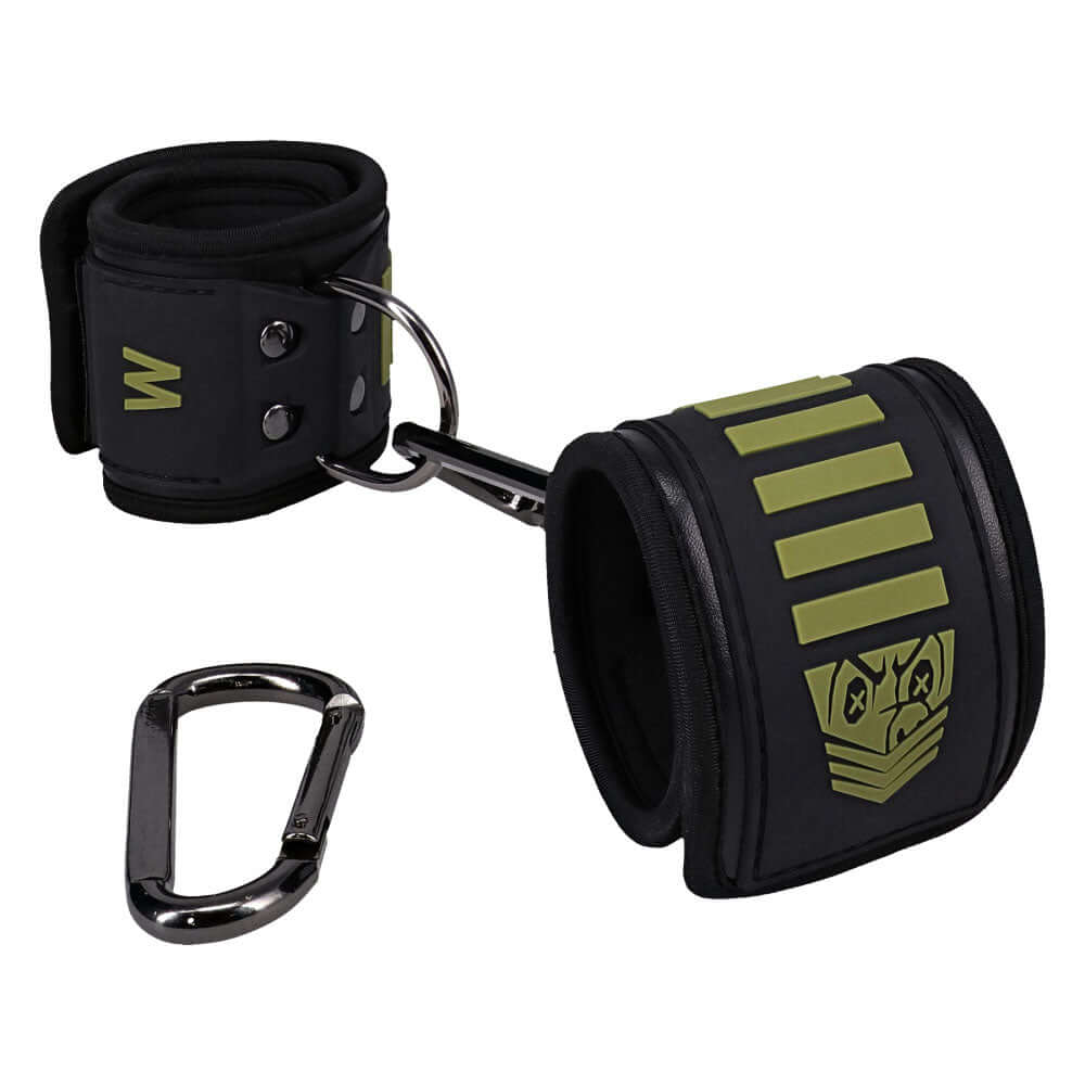 Fort Troff tactical bondage wrist cuffs in black and green with metal D-ring and Velcro straps.