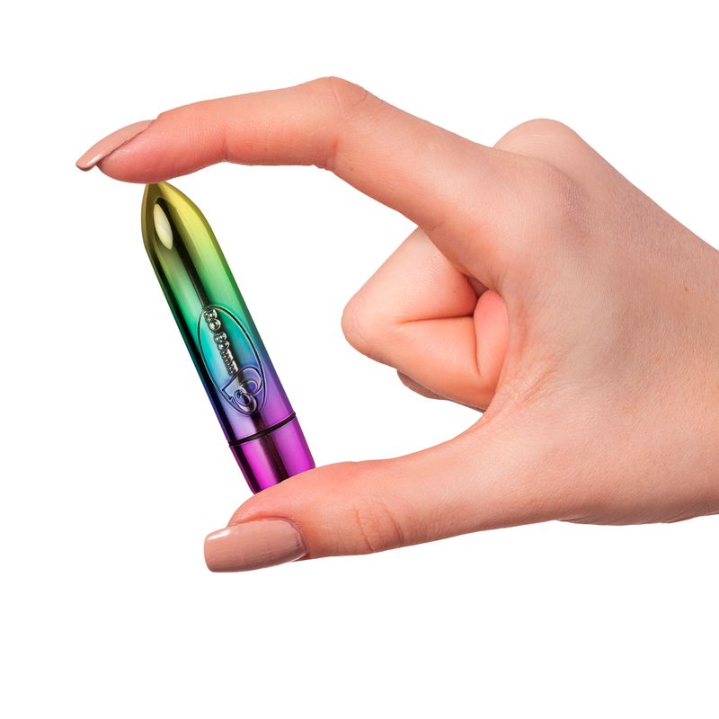 Hand holding the RO-80mm 7 Speed Rainbow Vibrating Bullet, showcasing its compact and colorful design for intimate essentials.