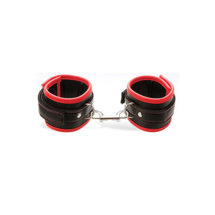 Adam & Eve vegan leather bondage cuffs with red trimming, adjustable for comfort and easy detachment.
