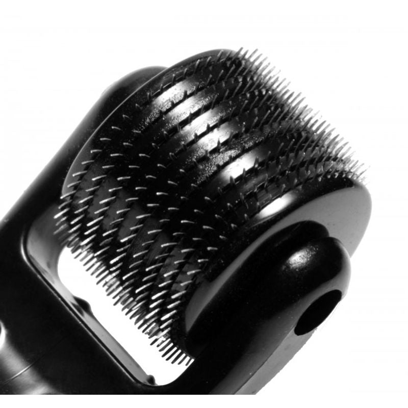 Prick 10 Row Spiked Pinwheel close-up featuring sharp pins for sensation play and intimacy.