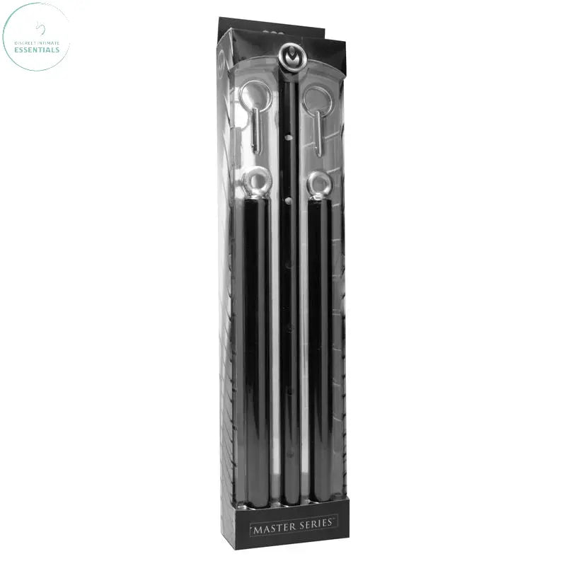 Adjustable steel spreader bar in packaging for bondage play, featuring eyebolts for cuff attachments.