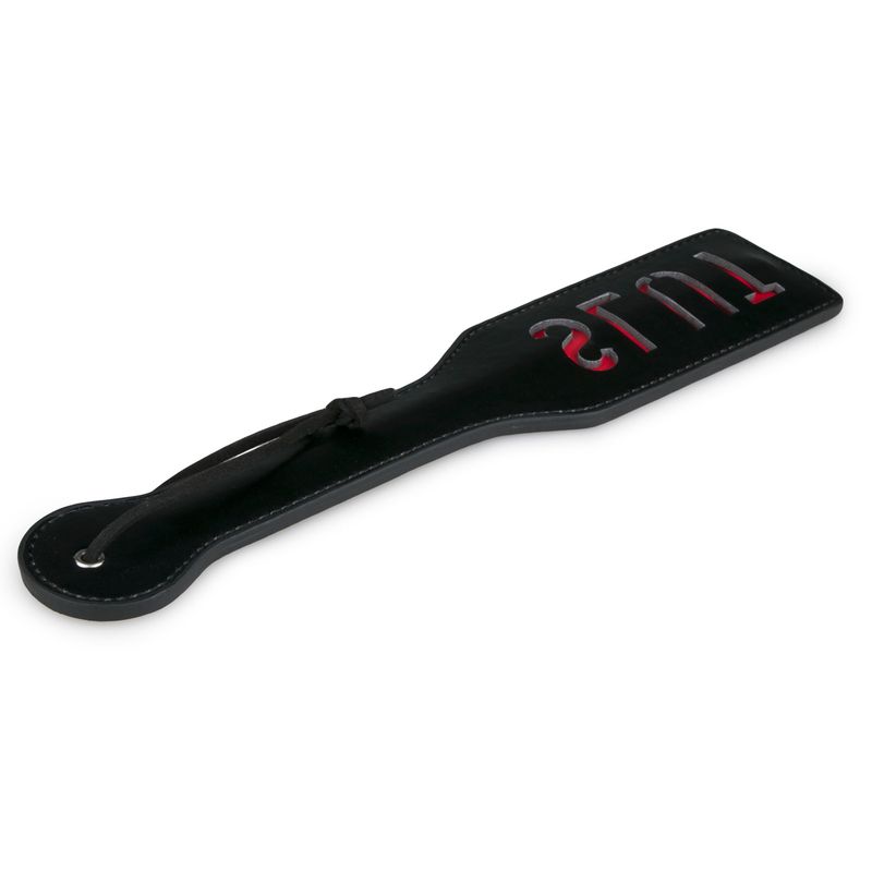 Paddle Slut black punishment paddle for couples with red inscription, perfect for playful spankings.