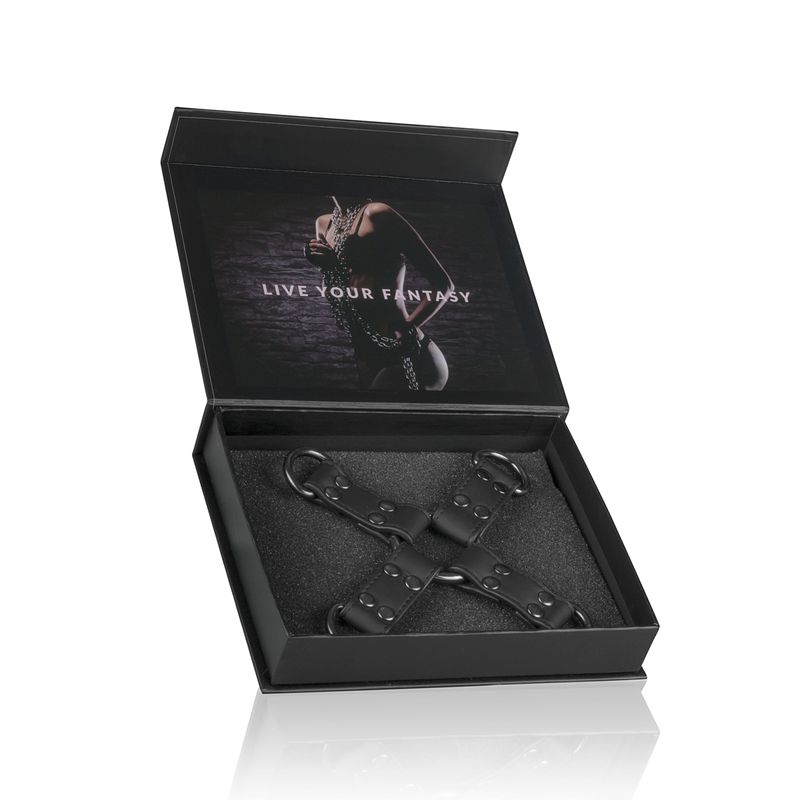 Faux leather hogtie displayed in box with 'Live Your Fantasy' text for bondage play.