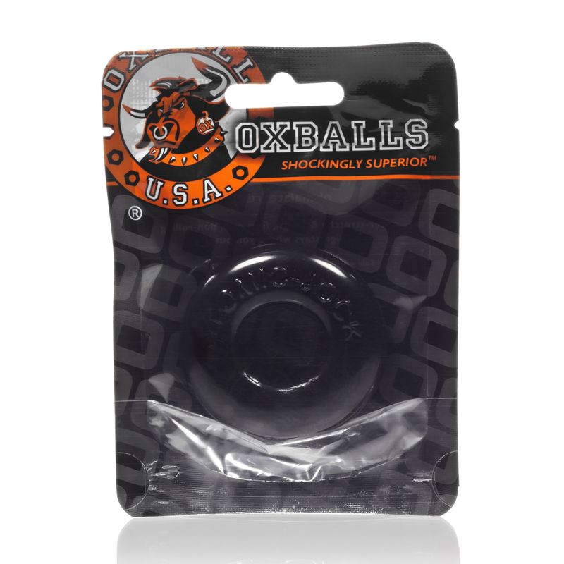 Large black cockring in packaging by Oxballs, featuring bold branding and a clear display of the product.