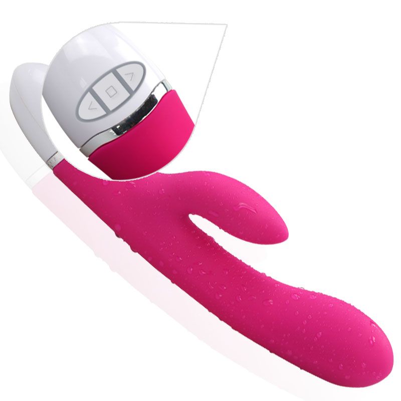Dreamer 7 mode silicone rechargeable rabbit vibrator in pink, waterproof, USB rechargeable, with touch buttons for ease of use.