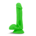 neon dual density dildo in bright green color with suction cup base for stability and realistic feel