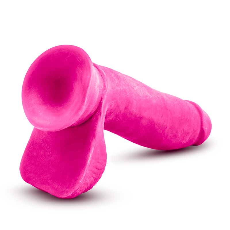 Au Naturel Bold Pleaser 7in dildo in pink, showcasing realistic silicone dildo design with a tapered head and straight shaft.