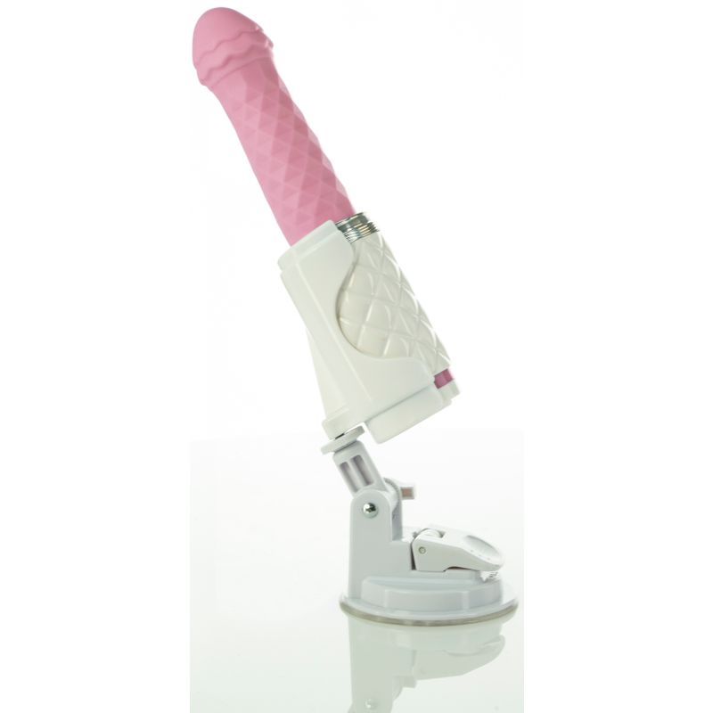 Pillow Talk Feisty Pink thrusting vibrator with diamond pattern handle, showcasing its sleek design and functionality.