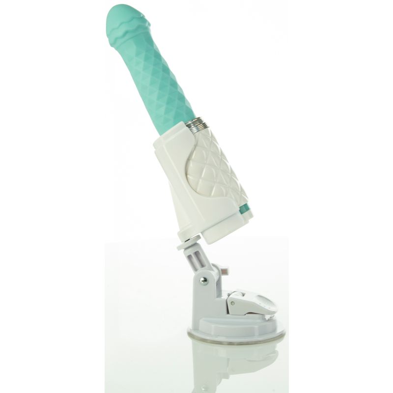 Pillow Talk thrusting vibrator in teal, featuring a diamond pattern handle and adjustable suction base for stability.