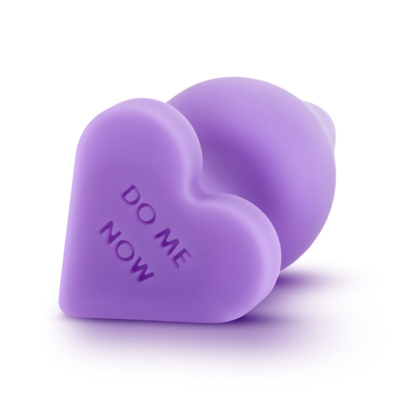 Cute heart-shaped butt plugs in purple silicone with engraved 'DO ME NOW' message.