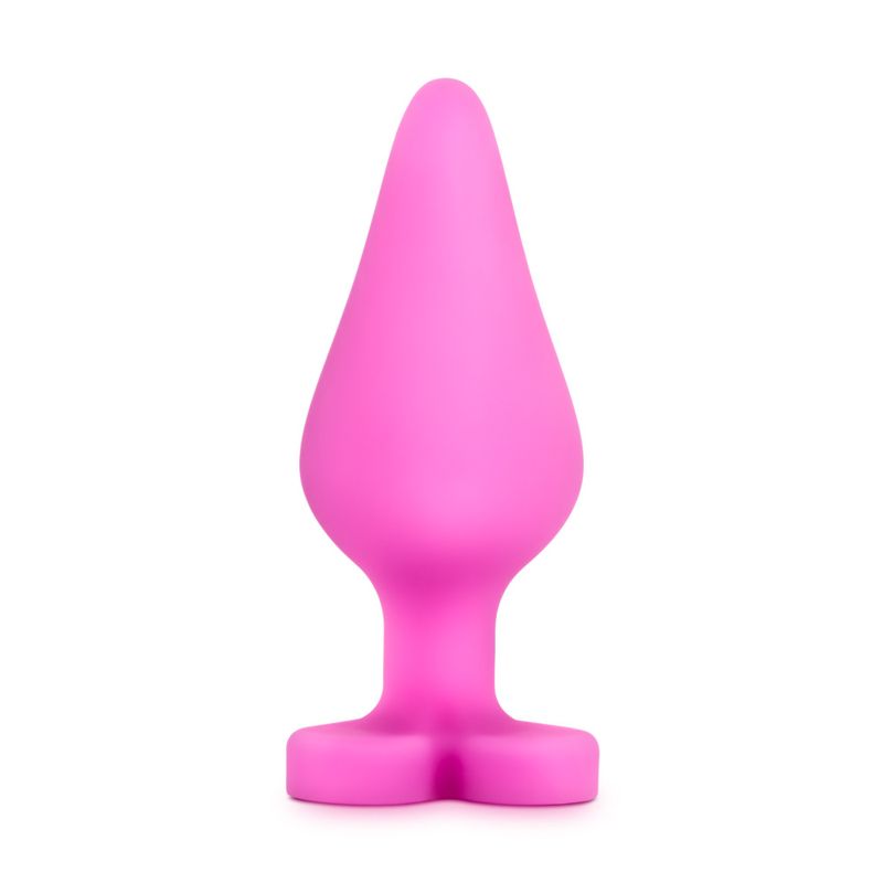 Naughtier Candy Heart Ride Me, a pink heart shaped butt plug perfect for intermediate anal play.