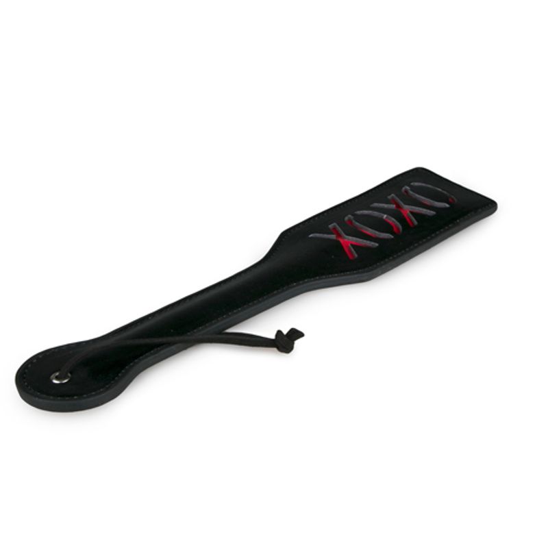 Paddle XOXO Black, an adult pleasure paddle designed for effective and comfortable use during playful spanking sessions.