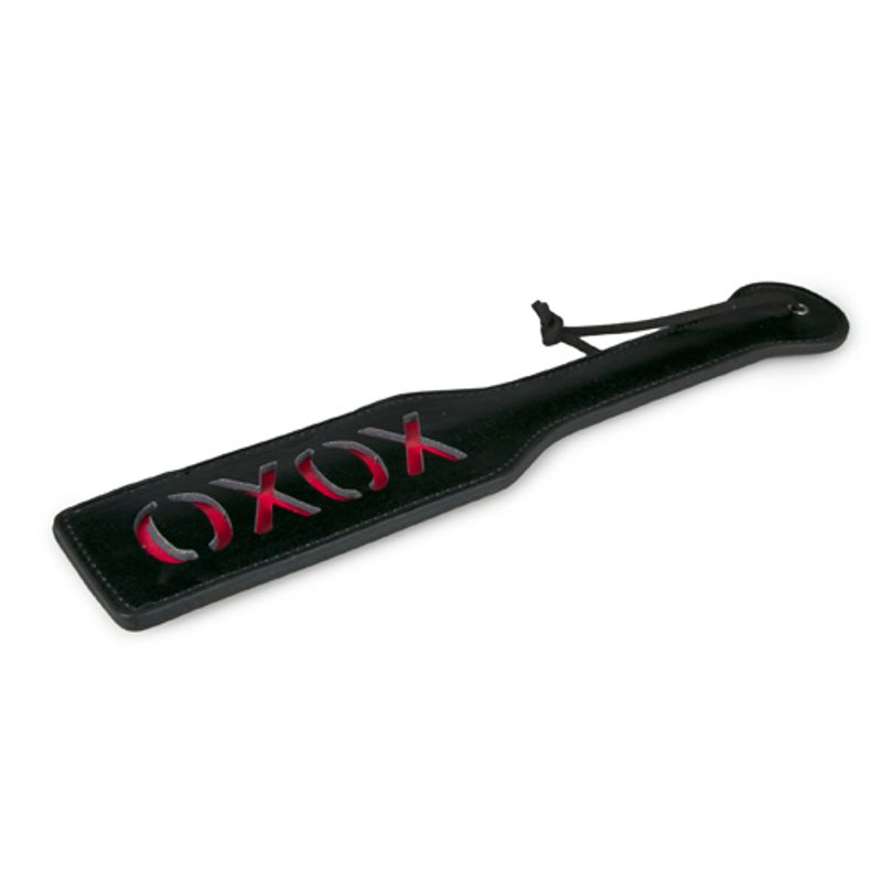 Paddle XOXO Black, a comfortable adult pleasure paddle for playful punishment sessions.