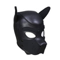 Puppy play mask black made of neoprene rubber with ears, detachable mouthpiece, and comfortable fit.