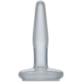 Small clear butt plug with tapered tip and flared base for beginners, made from body-safe materials.