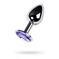 Silver anal plug with amethyst crystal showcased, featuring a shiny finish and a purple gemstone.