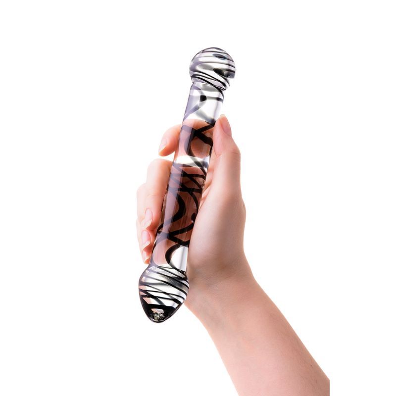 Hand holding the Sexus Glass Dildo Duo Black Swirl, a glass dildo for couples, showcasing its elegant design.