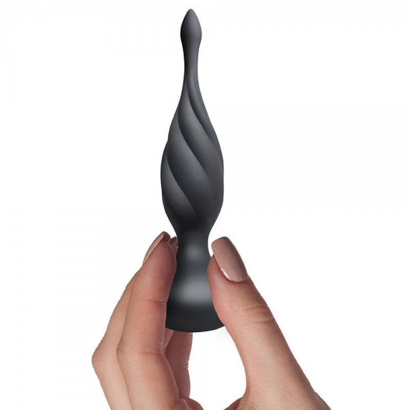 Petite Sensation Discover Butt Plug w Remote Black in hand, ideal for intimate exploration and pleasure.