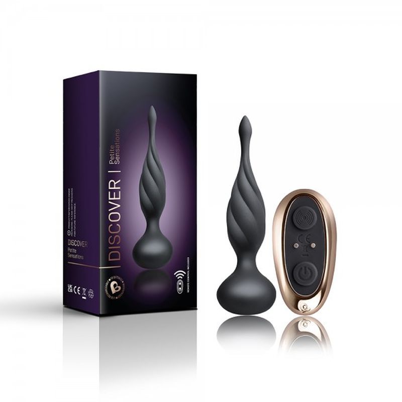 Petite Sensation Discover Butt Plug w Remote Black next to its packaging for intimate essentials.