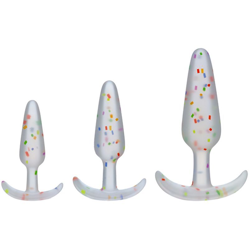 Rainbow anal trainer set featuring three silicone butt plugs in different sizes with colorful confetti design.