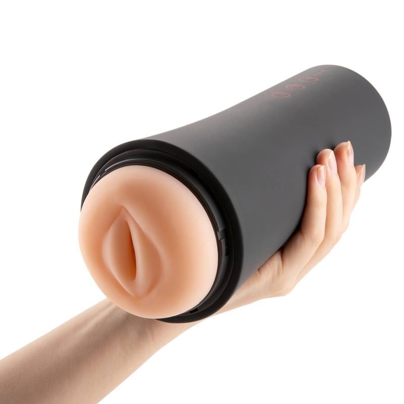 Inscup 2 Contracting Vibrating USB Masturbator in hand showcasing its sleek design and removable TPE sleeve.