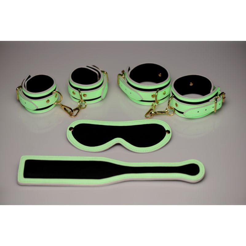 Kink In the Dark glowing bondage set including cuffs, paddle, and blindfold in fluro green color.