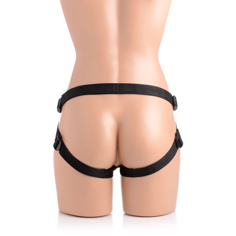 Brazen 8" silicone dildo with harness on mannequin, showcasing adjustable straps and durable design.