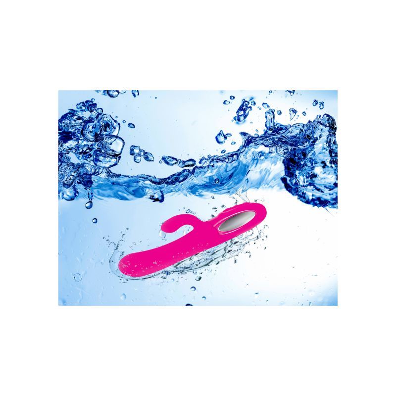 Viben Hypnotic Thrusting Rabbit Vibe floating in water with splashes, showcasing its hot pink silicone design.