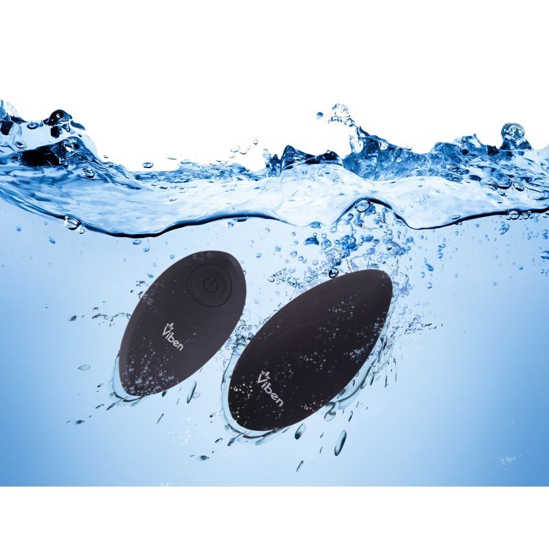 Viben Racy Multi Function Panty Vibe w Remote submerged in water, showcasing its waterproof design and sleek look.