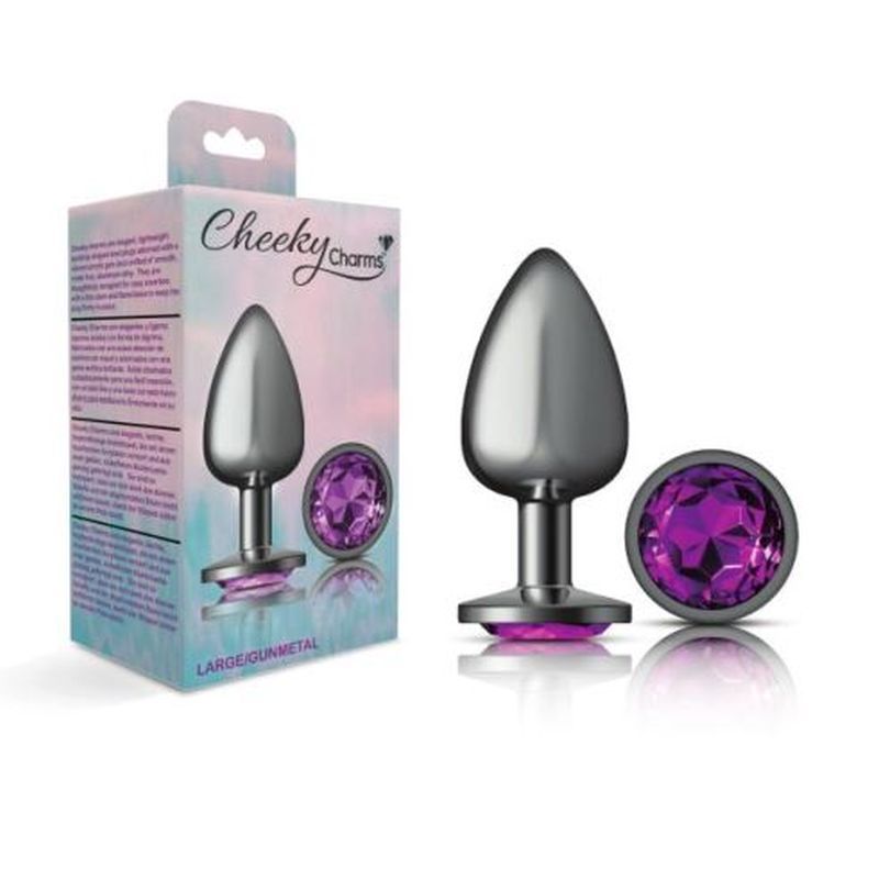 Cheeky Charms gunmetal butt plug with purple jewel displayed next to its packaging, showcasing an elegant and playful design.