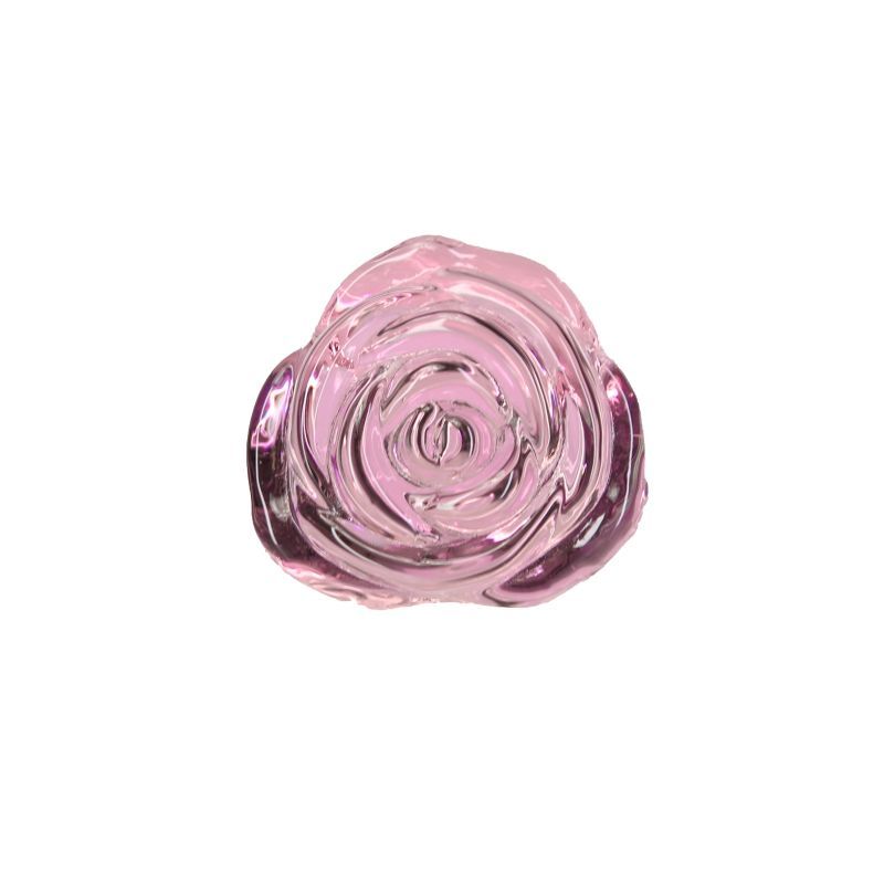 Close-up of a luxurious glass anal plug designed as a delicate pink rose with a shiny finish.