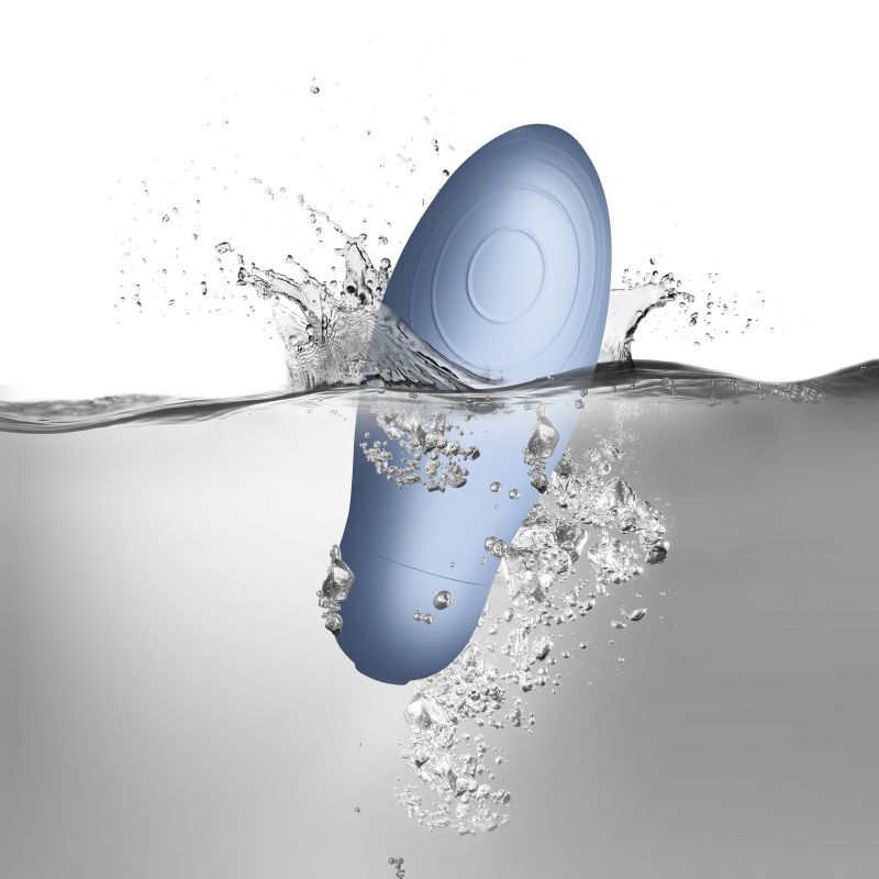 SugarBoo Blue Bae waterproof layon vibrator shown submerged in water, emphasizing its waterproof feature.