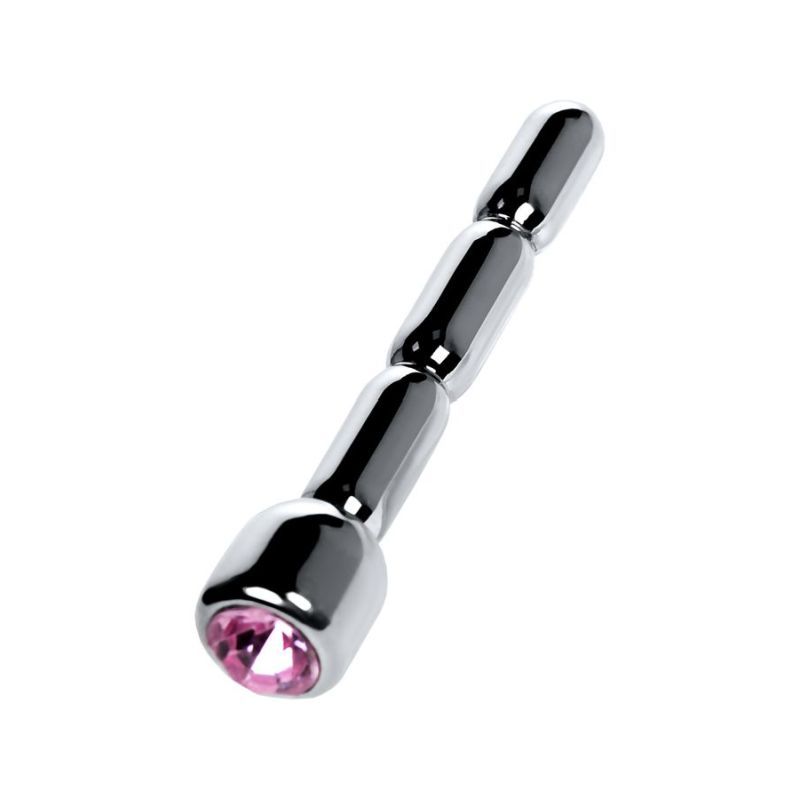 Silver urethral plug with ruby rhinestone on a white background, featuring a shiny metallic surface.