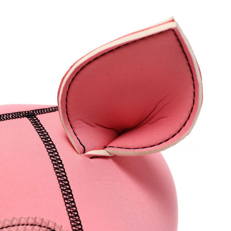 Close-up of the ear on a pink neoprene pig mask showcasing textured neoprene material.
