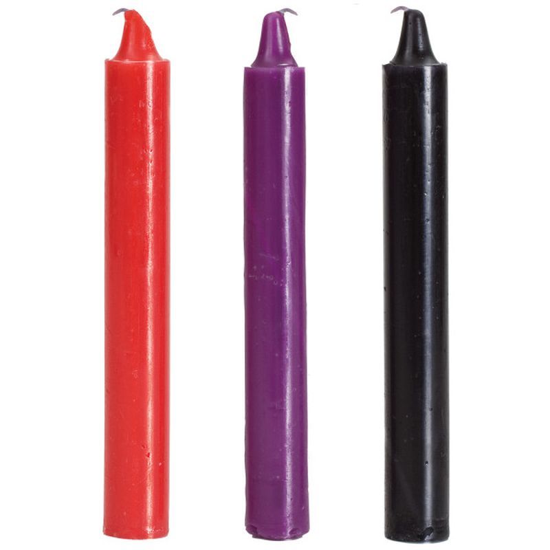 Japanese drip candles for hot wax play in red, purple, and black, ideal for adventurous couples and extreme sensations.