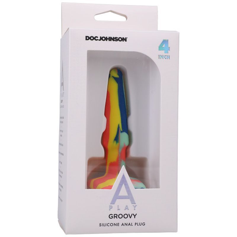 Groovy silicone anal plug 4in in colorful packaging showcasing tapered design and wide base for safe play.
