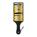 Naughty paddle for fetish play featuring a stylish black and gold design with "FUCK YOU" text.