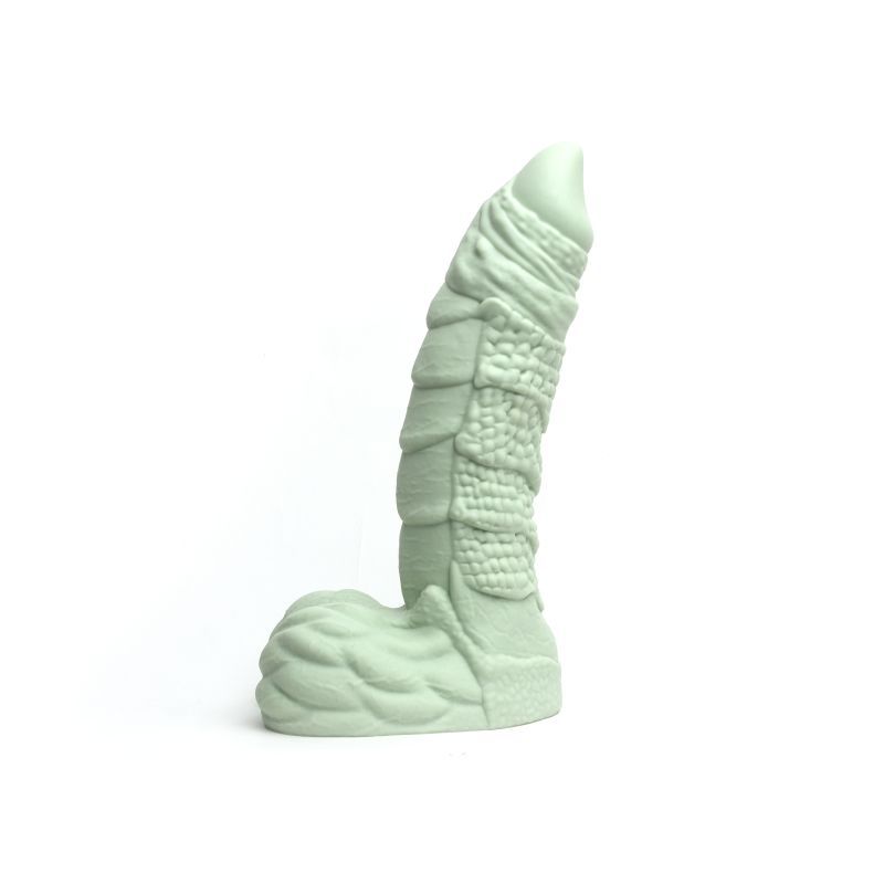 Willie liquid silicone dildo medium in soft green, showcasing detailed design and realistic texture.