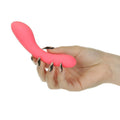 Person holding The Mini Swan Wand Glow Pink, a USB rechargeable, waterproof pleasure device in vibrant pink.