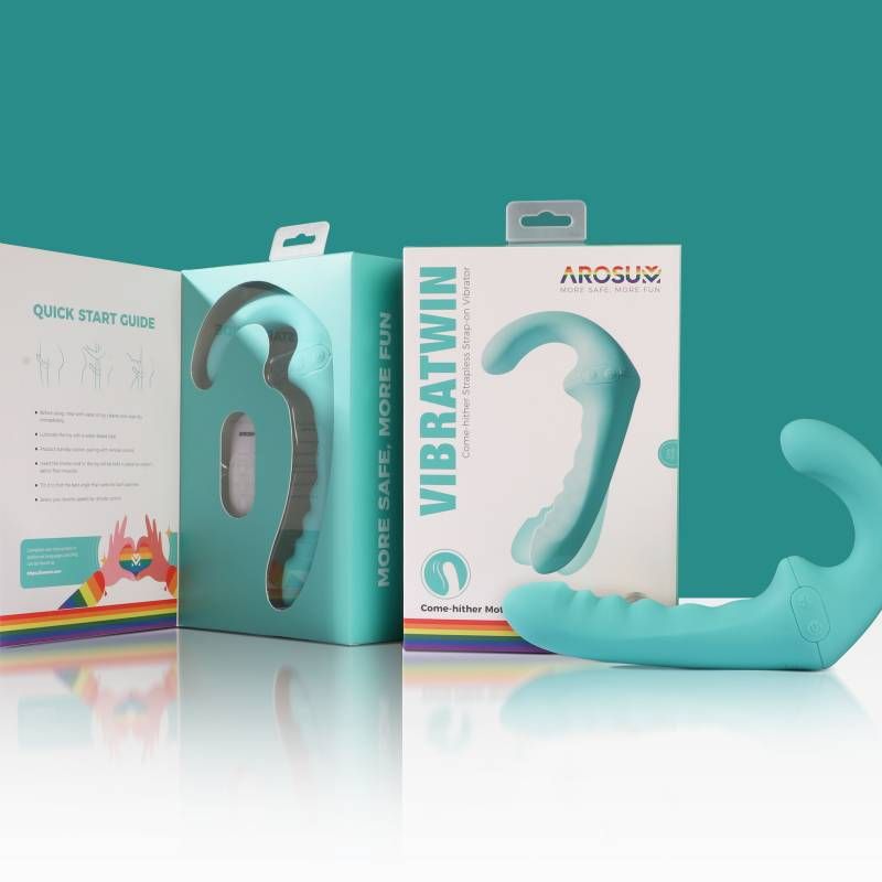 VibraTwin Rechargeable Strapless Strap On Vibrator with Remote and packaging for couples' pleasure.