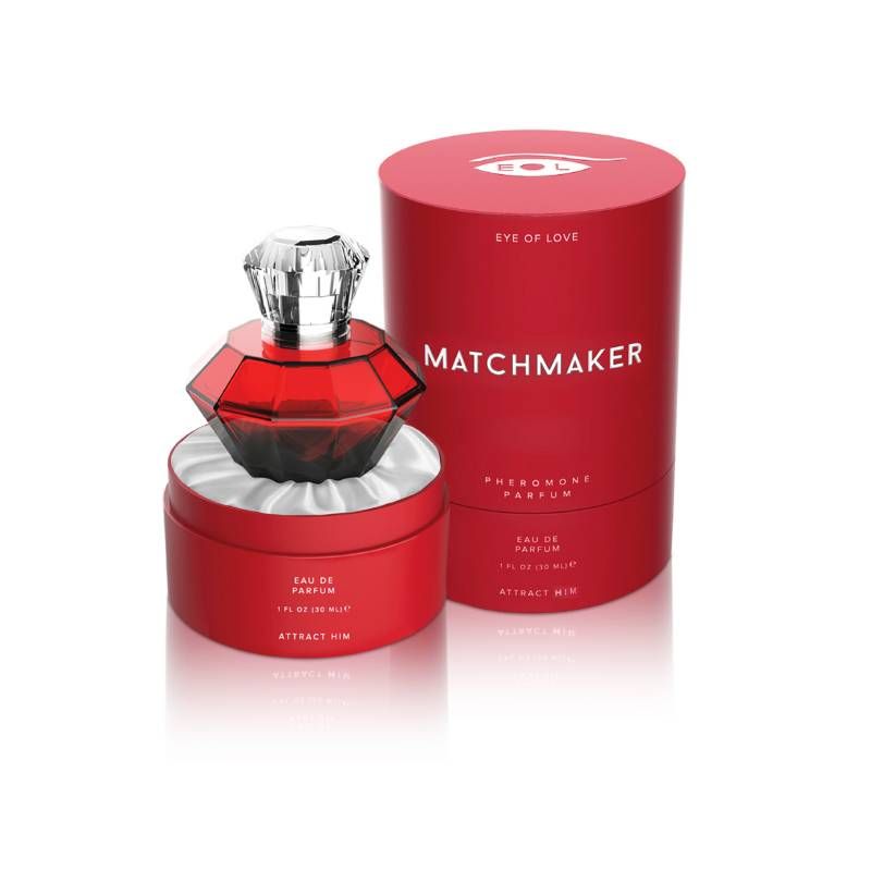 Matchmaker pheromone body spray for attraction in a red diamond-shaped bottle with luxurious packaging.
