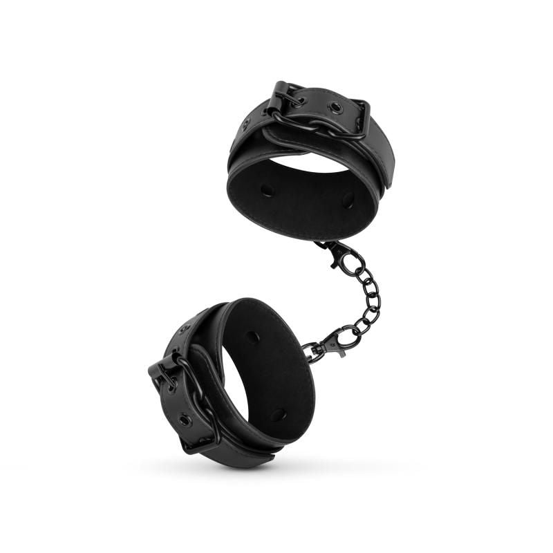 Faux Leather Handcuffs Black with adjustable straps and clip closures, connected by a metal chain.