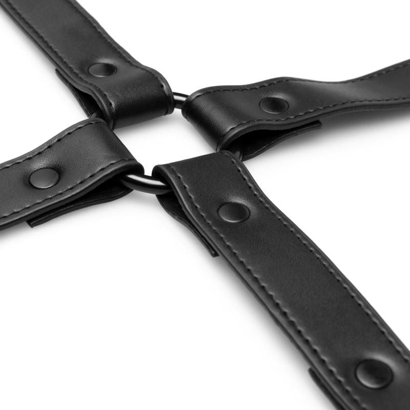 Close-up of the Hog Tie Black, featuring durable faux leather and clip closures for attaching cuffs.