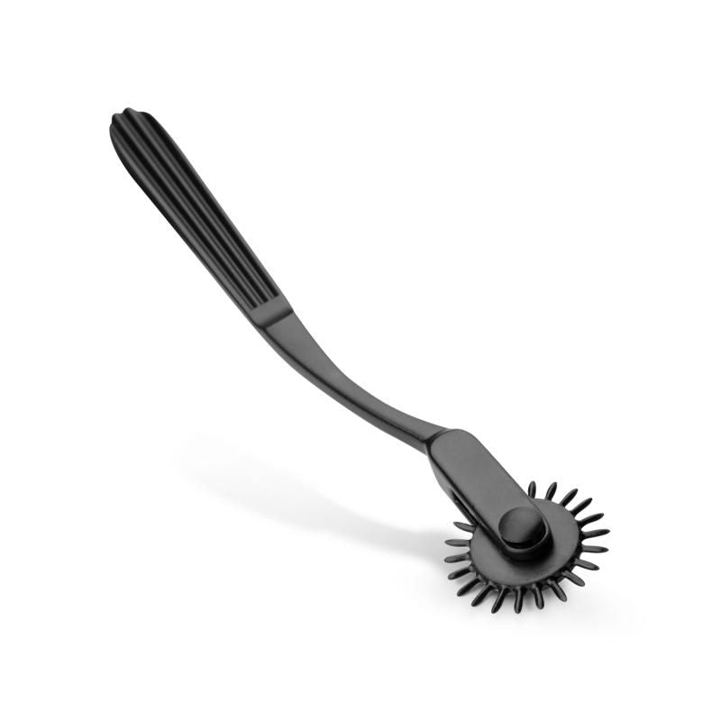 black Wartenberg pinwheel with spiked wheel design for stimulating sensations on the skin.
