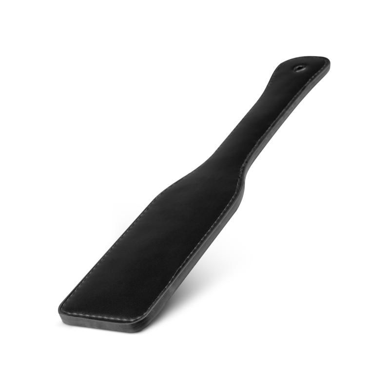 Faux Leather Paddle Black for BDSM games, providing a durable and comfortable grip for playful intimacy.