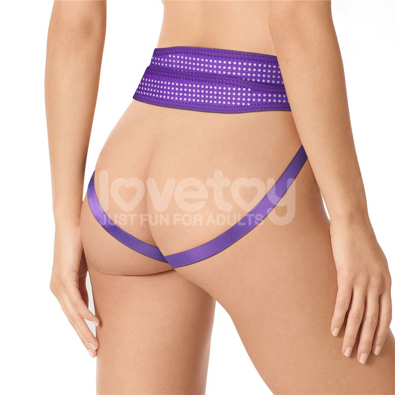adjustable strap on harness in polka dot purple design, showcasing a comfortable fit for diverse body shapes.