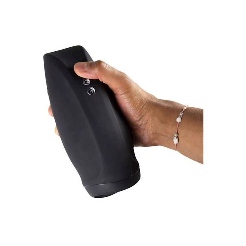 Air pressure masturbator held in a hand showcasing ergonomic design and adjustable settings for enhanced pleasure.