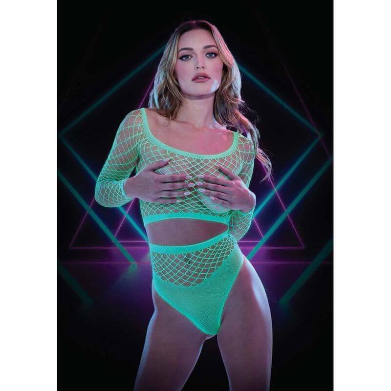 Glow In The Dark Long Sleeve Crop Top w Panty Set showcased on model, featuring neon fishnet design and glow-in-the-dark fabric.