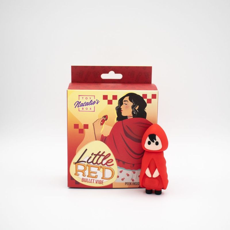 Compact bullet vibrator Little Red with packaging featuring a character in a red hood and playful design.